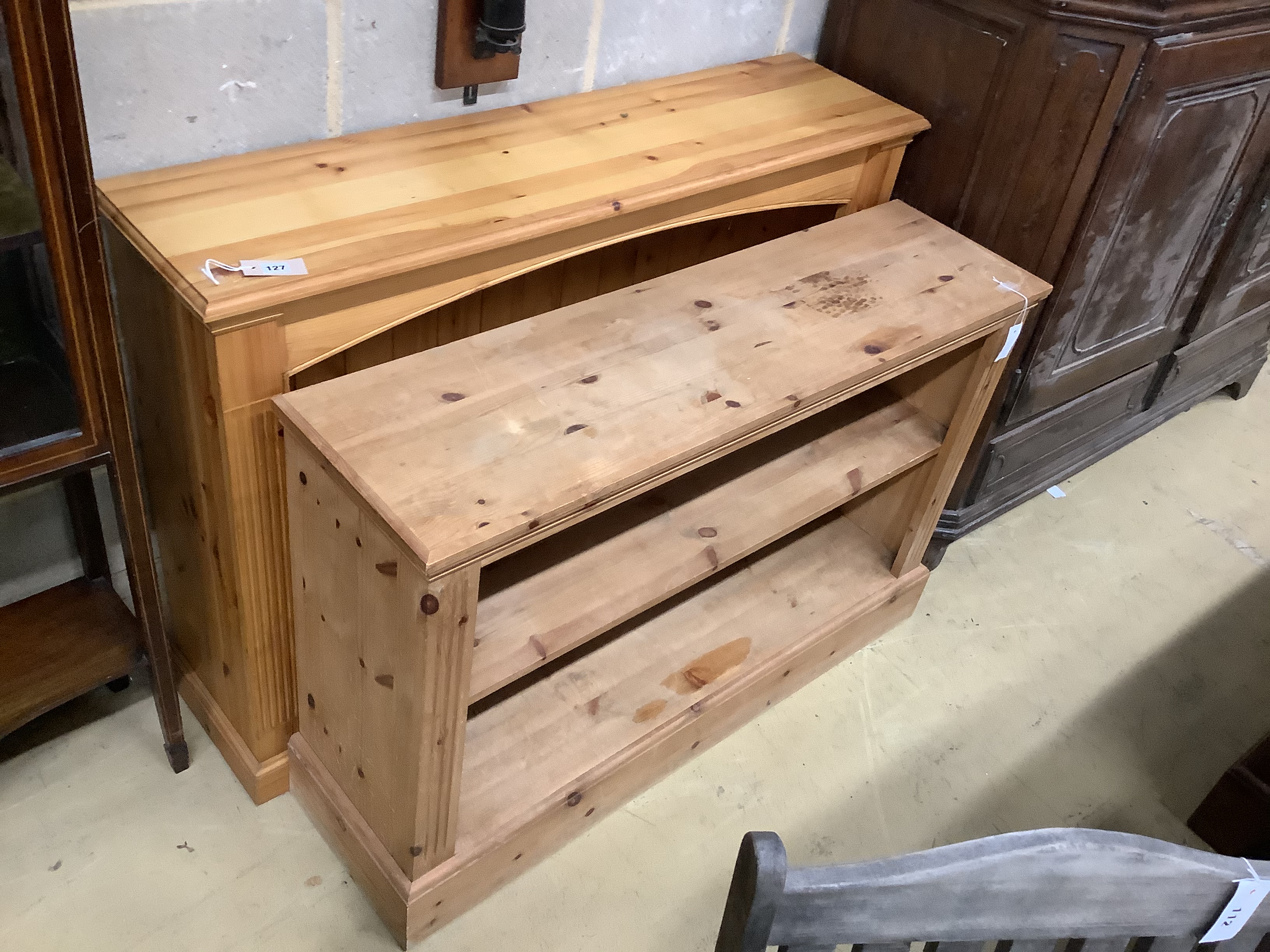 Two reproduction pine open bookcases, larger width 132cm, depth 33cm, height 94cm